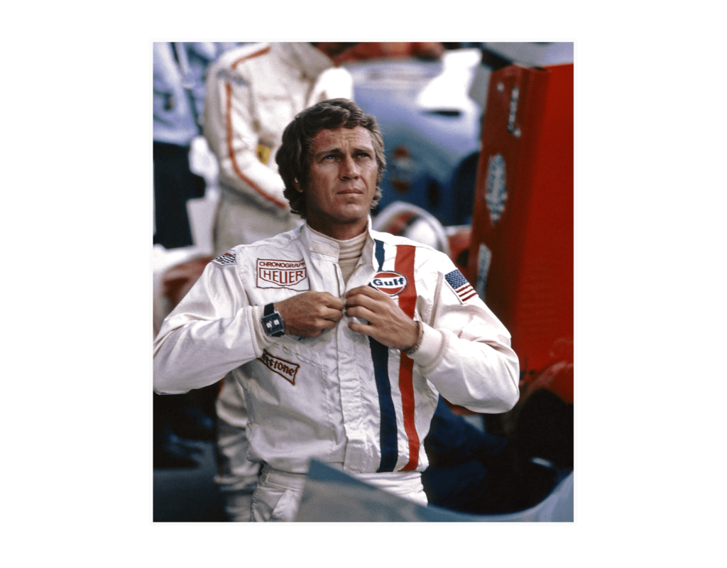 Steve McQueen vestito da gara indossa un Heuer Monaco