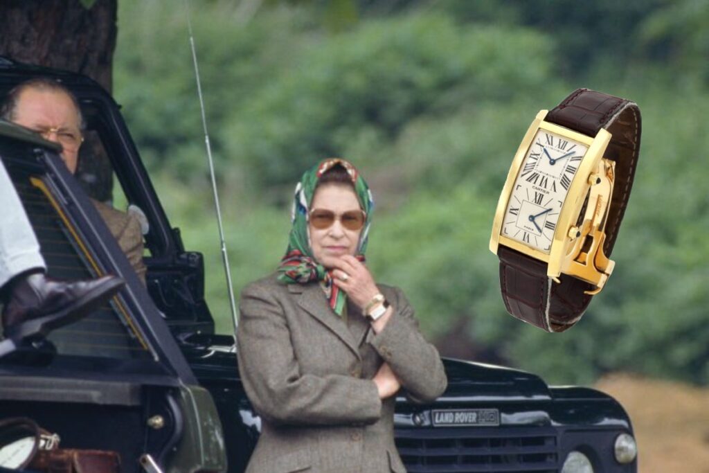 La regina Elisabetta II in tenuta di caccia con indosso un Cartier Tank Cintrée con doppio fuso orario