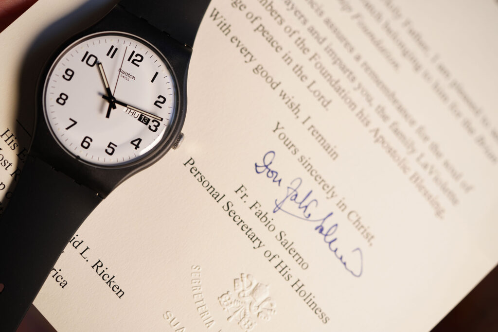 Pope Francis' watch and donation letter