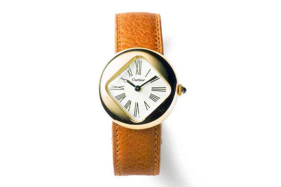 one of the Cartier Pebble or Cartier Baseball watches from the Cartier archives
